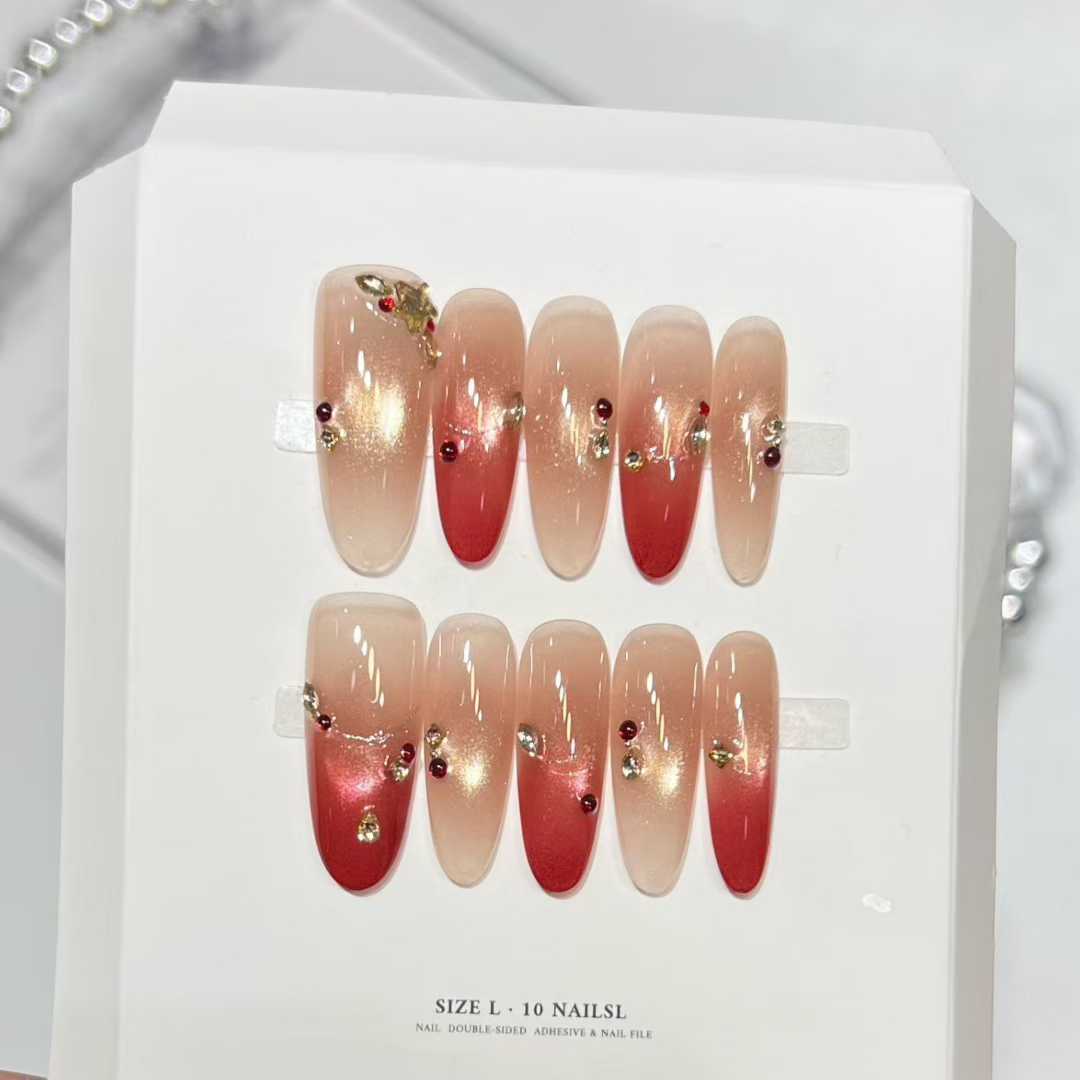 Nude-to-burgundy gradient press-on nail set displayed on a size L card