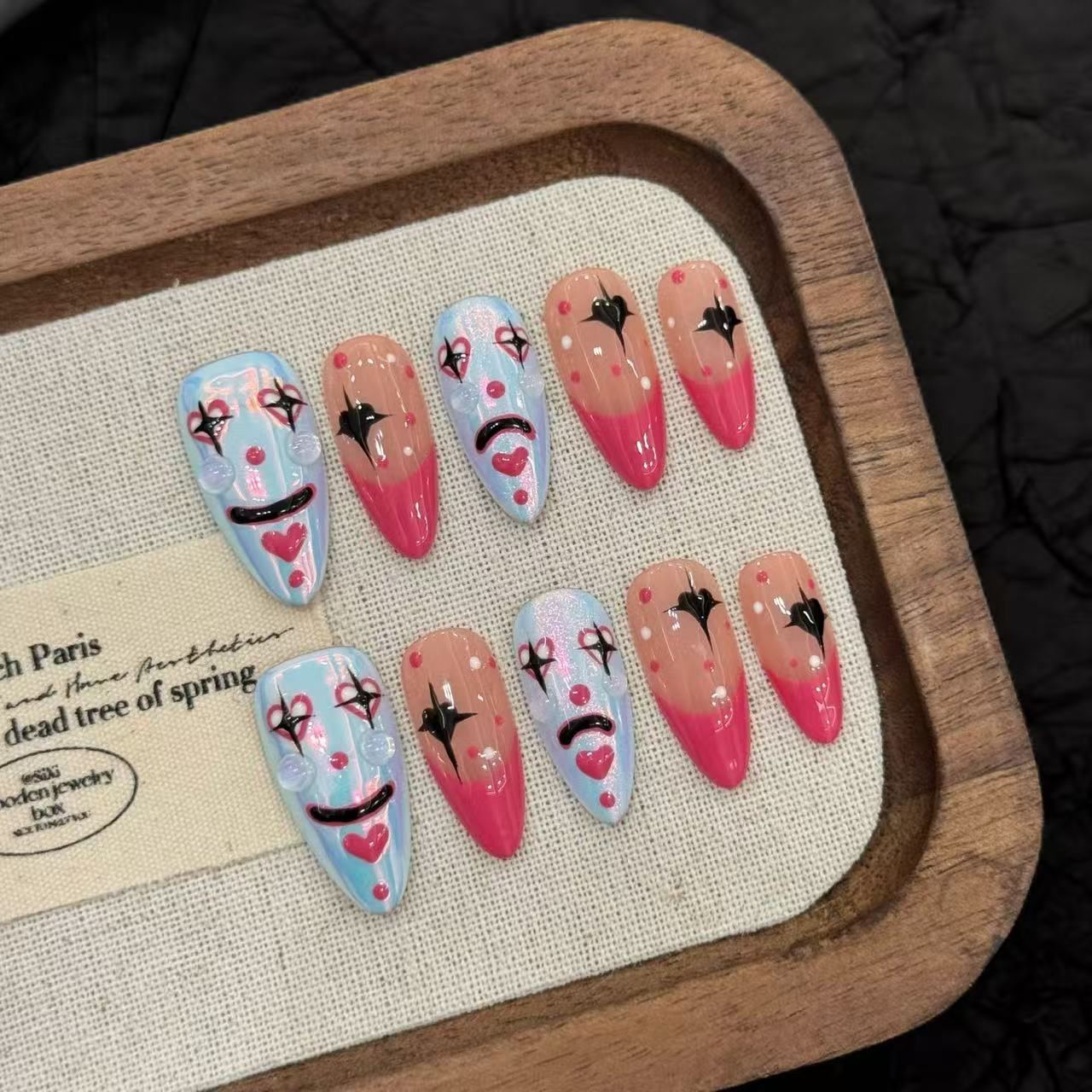 Y2K clown art press-on nails with holographic blue and pink French gradient